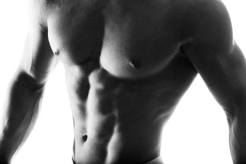 Wall Mural - Close up of muscular bodybuilder guy doing exercises with weights isolated on white. Monochrome