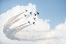 Show Of Force Jets, Planes Carry A Figure On A Background Of Clouds, Wallpaper With Airplanes, Jets Is Rotated In The Sky