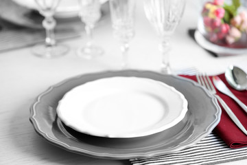 Poster - Table set at restaurant on light background