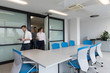 © .shock - business people group entering meeting room, motion blur