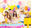 © Africa Studio - Happy group of children having fun at birthday party