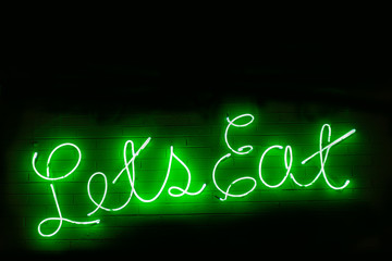 Wall Mural - Let's Eat Neon Sign for a Restaurant