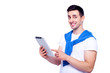 © HBS - Smart technology makes everything easier. Confident young man in shirt working on digital tablet and smiling while standing against white isolated background