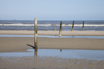 Sticker - Holzpfähle im Meer, Norderney, Ostfriesland, Niedersachsen, Deutschland