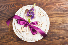 Tableware With Violet Lupinus And Silverware