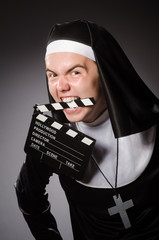 Wall Mural - Funny man wearing nun clothing