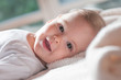 © poplasen - Portrait of cute baby girl lying down