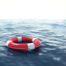 Red Lifebuoy In Blue Sea With Depth Of Field Effect. 3d Illustration