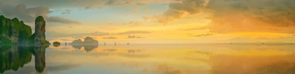 Wall Mural - sunset with colorful sky and boat on the beach