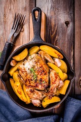 Wall Mural - Roasted whole chicken with potatoes and thyme