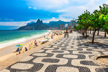 Fototapete - Ipanema beach with mosaic of sidewalk in Rio de Janeiro. Brazil