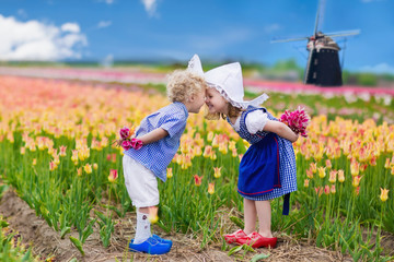 Dutch children in tulip field