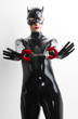 © Richard Semik - portrait of woman wearing latex clothes with handcuffs