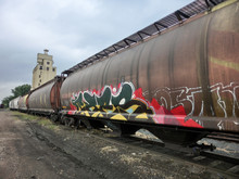 Industrial Urban Weathered Rusty Train With Painted Graffiti