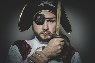 serious, man pirate with eye patch and old hat with funny faces