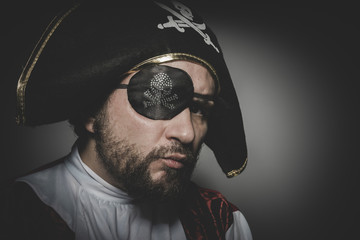 vintage, man pirate with eye patch and old hat with funny faces