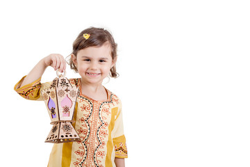 Greeting Card : Ramadan Kareem - Translation : Muslim Holy Month Ramadan is generous - Happy young girl playing with Ramadan lantern
