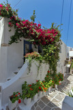 Fototapeta Uliczki - House with flowers in Naxos island, Cyclades