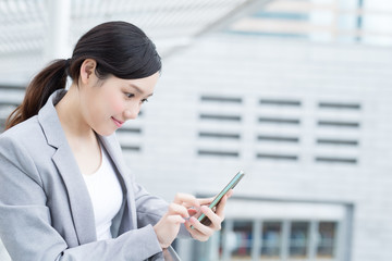 Wall Mural - business woman use smart phone