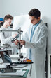 © StockPhotoPro - Engineers in the lab using a 3D printer