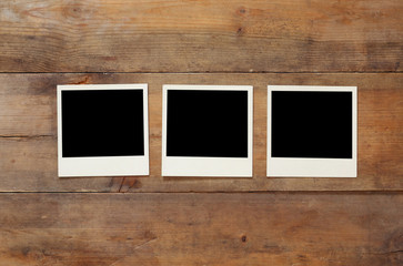 Wall Mural - top view of blank instant photos album