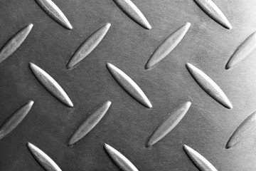 metal plate close-up in black and white scene,emboss pattern texture of metal plate or metal sheet for anti-slip