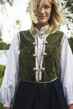 A Woman Wearing A Traditional Costume, Dalarna, Sweden.