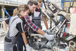 © Atelier 211 - young apprentice with professional metallurgist