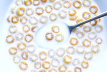 Wheat, Rice And Corn Rings In Milk For Breakfast