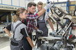 © Atelier 211 - young apprentice with professional metallurgist