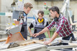 © Atelier 211 - young apprentice with professional carpenter