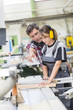 © Atelier 211 - young apprentice with professional carpenter