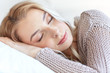 © Syda Productions - woman or teenage girl sleeping on pillow at home