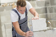 © Atelier 211 - Young builder at work