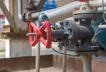 Sticker - Faucet with steel pipes in natural gas processing plant in summer day