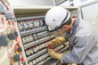 © Atelier 211 - electrician at work