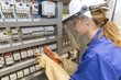© Atelier 211 - young electrician woman at work
