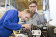 © Atelier 211 - young apprentice with heating professional
