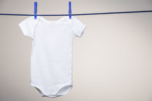 Baby Bodysuit On Clothesline