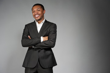 happy black male in a suit