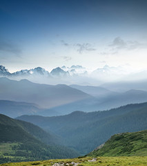 hills during sunrise in mountain valley. beautisul natural landscape