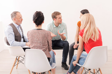 Frustrated guy is consulting on therapy session