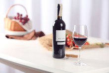 Glass Of Wine With Food On Blurred Background