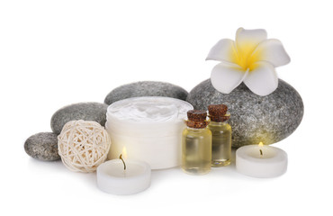 Poster - Spa treatment with stones and cream isolated on white