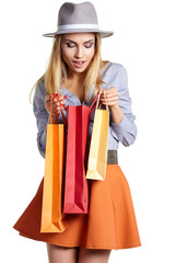 Wall Mural - Smiling woman hold shopping bag.