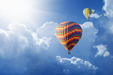 Poster - Hot air balloons flies in blue sky