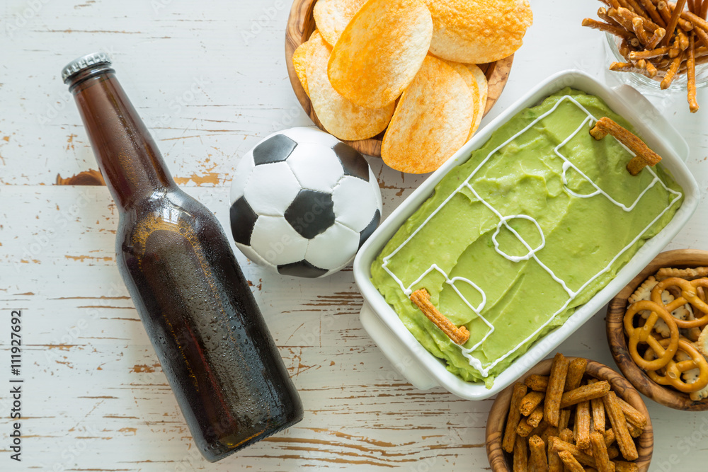 Foto de Stock Selection of party food for watching football ...