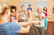 © Robert Kneschke - Seniorin macht Pilates Übung