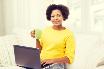 Sticker - happy african american woman with laptop at home