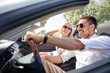 © Syda Productions - happy man and woman driving in cabriolet car